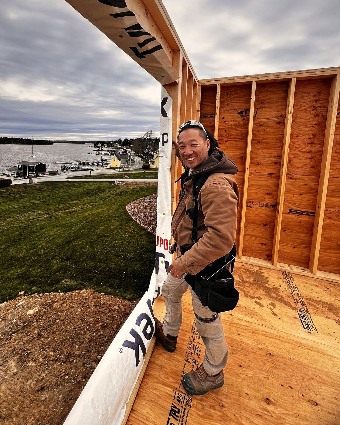 DK Ko, owner of EN Carpentry, on a framing job overlooking the water